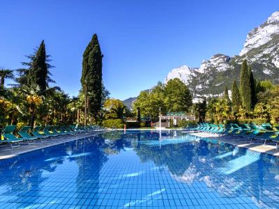 outdoor pool - hotel du lac et du parc grand resort - riva del garda, italy