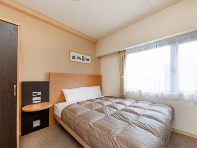 bedroom - hotel the onefive okayama - okayama, japan