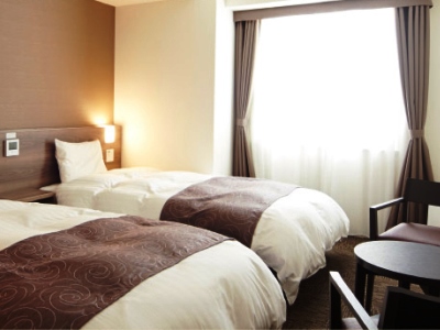 bedroom 1 - hotel dormy inn premium nagoya sakae - nagoya, japan