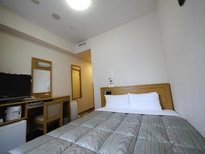bedroom - hotel route-inn sapporo kitayojo - sapporo, japan