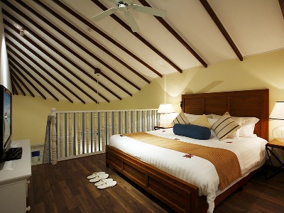 bedroom - hotel centara grand island resort and spa - maldives, maldives