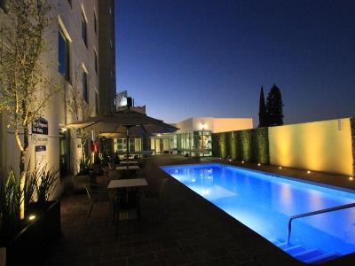 outdoor pool - hotel hampton inn by hilton leon guanajuato - leon, mexico