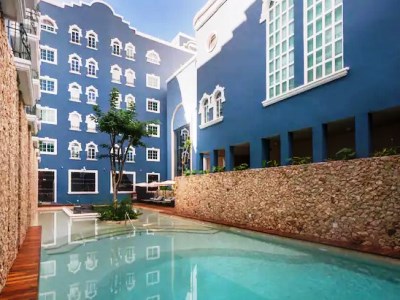 outdoor pool - hotel villa mercedes merida, curio collection - merida, mexico