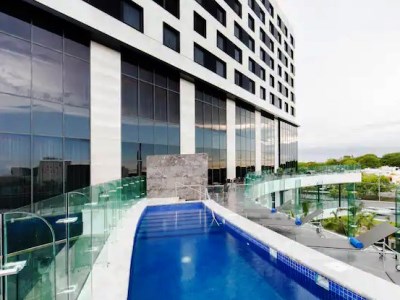 outdoor pool - hotel hilton garden inn merida - merida, mexico