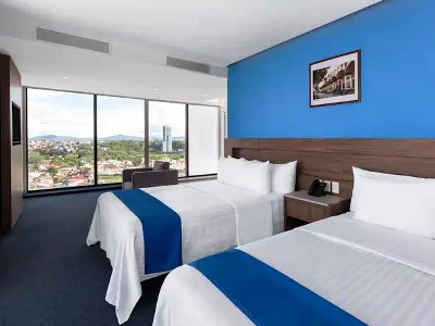 bedroom 1 - hotel wyndham puebla angelopolis - puebla, mexico