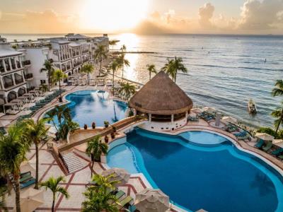 outdoor pool - hotel wyndham alltra playa del carmen adults - playa del carmen, mexico