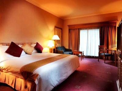 bedroom - hotel riverside majestic - astana wing - kuching, malaysia
