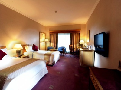 bedroom 1 - hotel riverside majestic - astana wing - kuching, malaysia