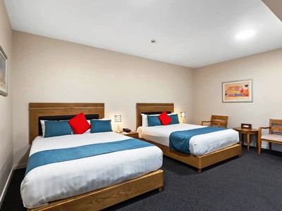 bedroom 1 - hotel ramada by wyndham hamilton city center - hamilton, new zealand