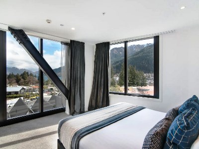 bedroom 1 - hotel ramada by wyndham queenstown central - queenstown, new zealand
