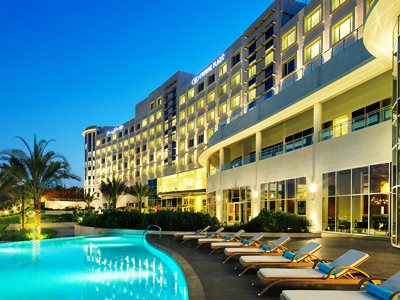 outdoor pool - hotel crowne plaza muscat ocec - muscat, oman