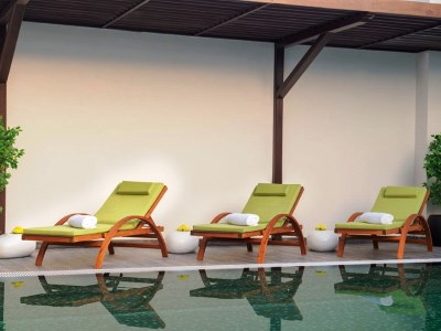 outdoor pool - hotel wyndham garden muscat al khuwair - muscat, oman