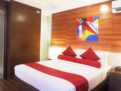 bedroom - hotel valero grand suites by swiss-belhotel - manila, philippines