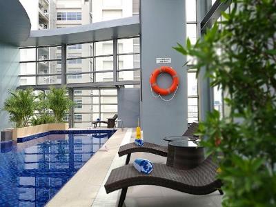 indoor pool - hotel valero grand suites by swiss-belhotel - manila, philippines
