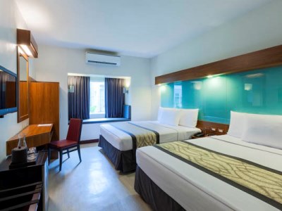 bedroom 1 - hotel microtel by wyndham up technohub - quezon, philippines
