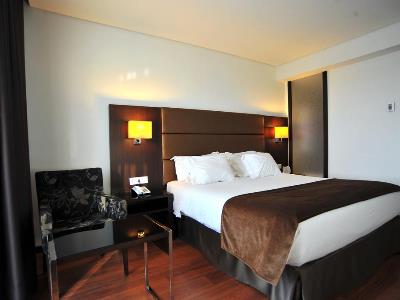 bedroom - hotel axis porto business and spa - porto, portugal