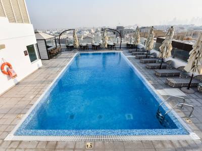 outdoor pool - hotel the avenue, a murwab - doha, qatar