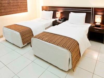 bedroom 2 - hotel la villa - doha, qatar