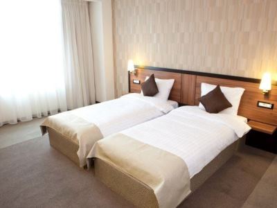 bedroom - hotel europa royale - bucharest, romania
