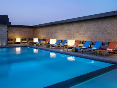 outdoor pool - hotel aloft riyadh - riyadh, saudi arabia
