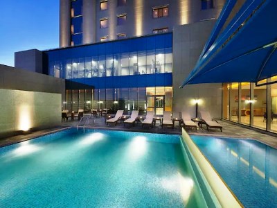 outdoor pool - hotel hilton garden inn tabuk - tabuk, saudi arabia