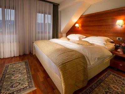 bedroom - hotel hotel lovec bled - bled, slovenia