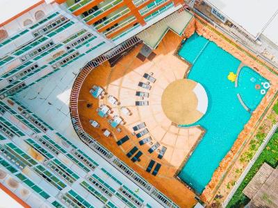 outdoor pool - hotel centara nova hotel and spa pattaya - pattaya, thailand