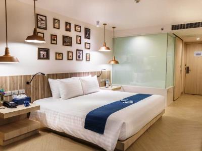 bedroom 1 - hotel golden tulip pattaya beach resort - pattaya, thailand