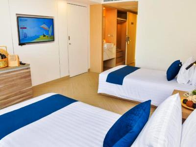bedroom 2 - hotel golden tulip pattaya beach resort - pattaya, thailand