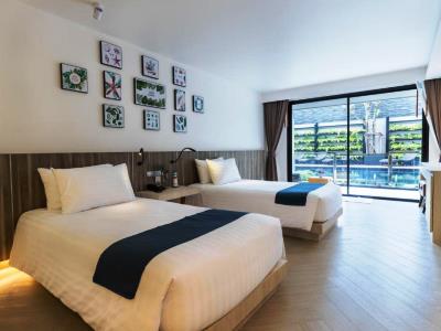 bedroom 3 - hotel golden tulip pattaya beach resort - pattaya, thailand