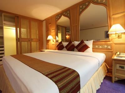 bedroom - hotel montien hotel surawong bangkok - bangkok, thailand