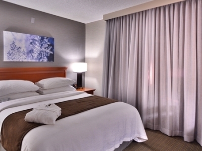 bedroom - hotel embassy suite hilton denver central park - denver, colorado, united states of america