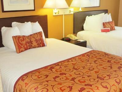 bedroom 1 - hotel ramada suites orlando airport - orlando, united states of america