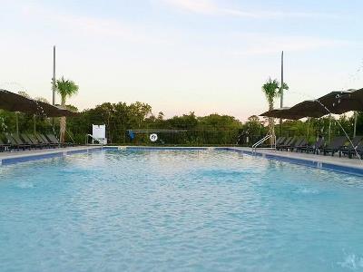 outdoor pool - hotel magic village views,trademark collection - orlando, united states of america
