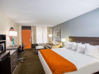 bedroom - hotel days inn and suites orlando airport - orlando, united states of america