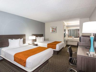 bedroom 1 - hotel days inn and suites orlando airport - orlando, united states of america