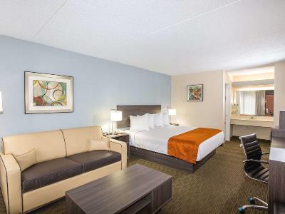 bedroom 3 - hotel days inn and suites orlando airport - orlando, united states of america