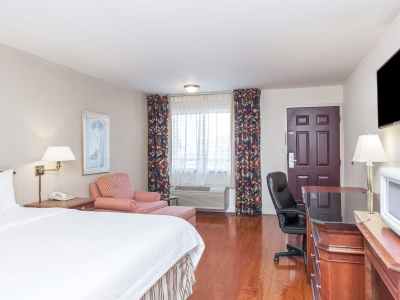 bedroom - hotel days inn and suites by wyndham sunnyvale - sunnyvale, united states of america