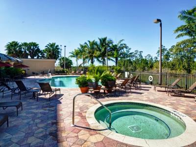 outdoor pool - hotel embassy suites fort myers estero - estero, united states of america