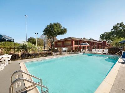 outdoor pool - hotel days inn by wyndham pensacola west - pensacola, united states of america