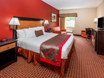 bedroom 1 - hotel ramada by wyndham locust grove - locust grove, georgia, united states of america