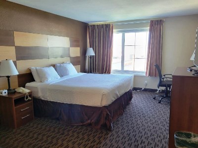 bedroom 1 - hotel americinn by wyndham cedar rapids north - cedar rapids, united states of america