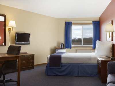 bedroom 1 - hotel travelodge by wyndham motel of st cloud - saint cloud, united states of america