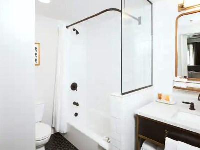 bathroom - hotel phillips, curio collection by hilton - kansas city, missouri, united states of america