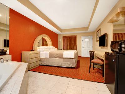 bedroom 2 - hotel days inn n suites niagara falls/buffalo - niagara falls, united states of america