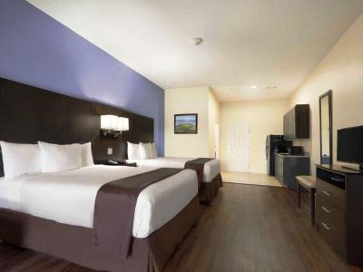 bedroom 1 - hotel days inn n suites galveston west/seawall - galveston, united states of america