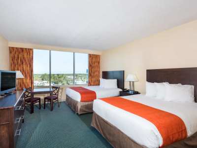 bedroom 1 - hotel ramada by wyndham gateway - kissimmee, united states of america