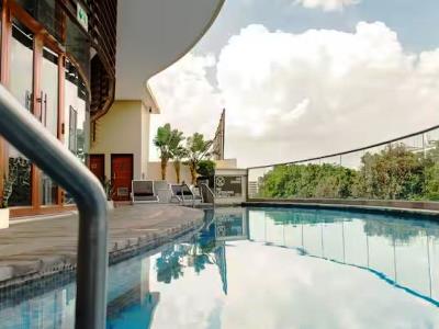 outdoor pool - hotel hilton garden inn society business park - lusaka, zambia